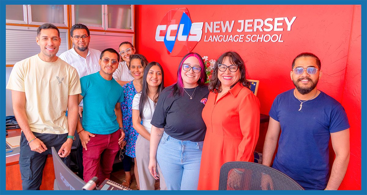 Why CCLS. Image description: Group of four young women smiling and hugging each other. 